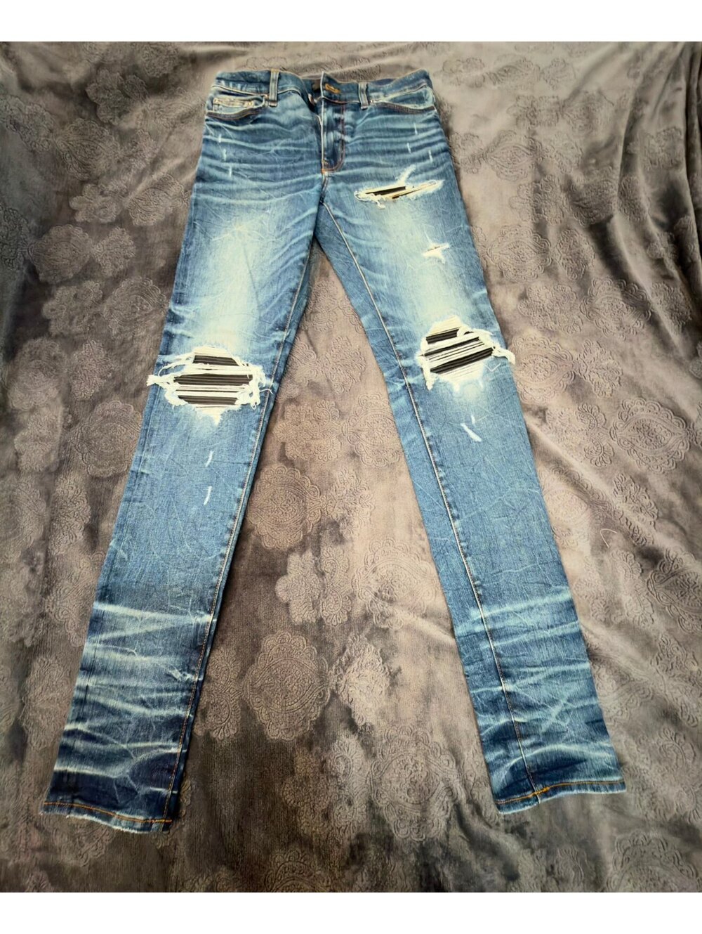 Amiri Distressed Blue Skinny Jeans with Ripped Details